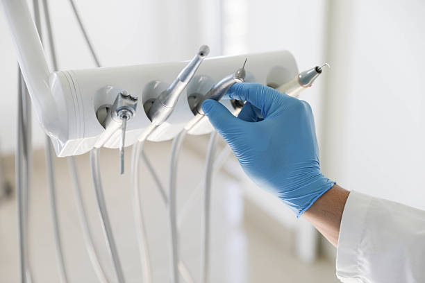 Professional Root Canal Treatment technician working in Byhalia, MS
